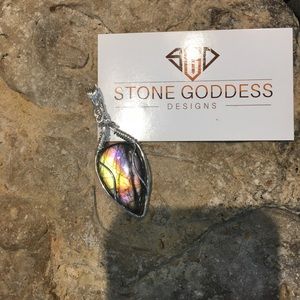 Purple labradorite in fine silver pendant